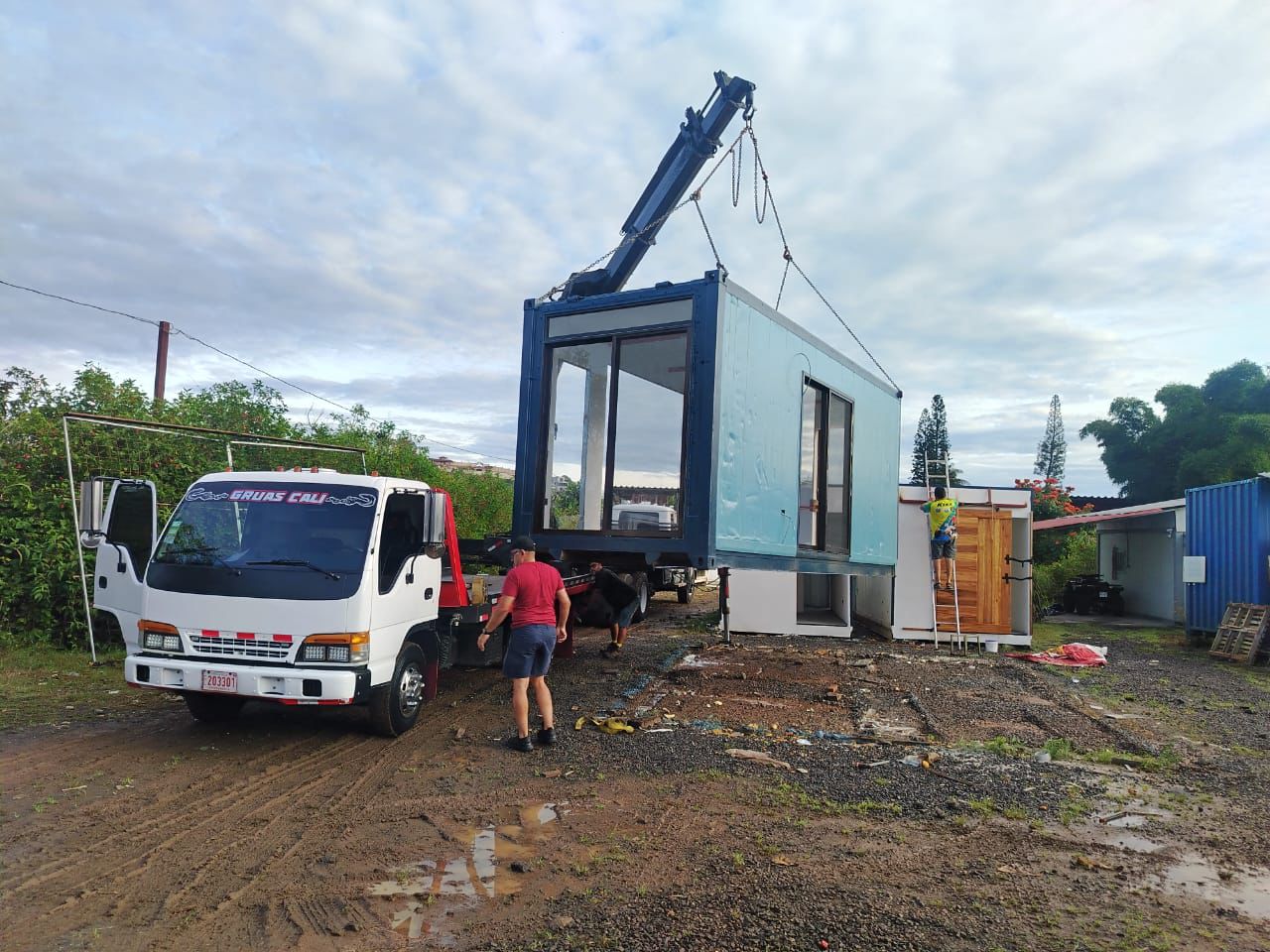 Costa Rica's Most Trusted Container Home Builders — professional construction site with lush tropical backdrop